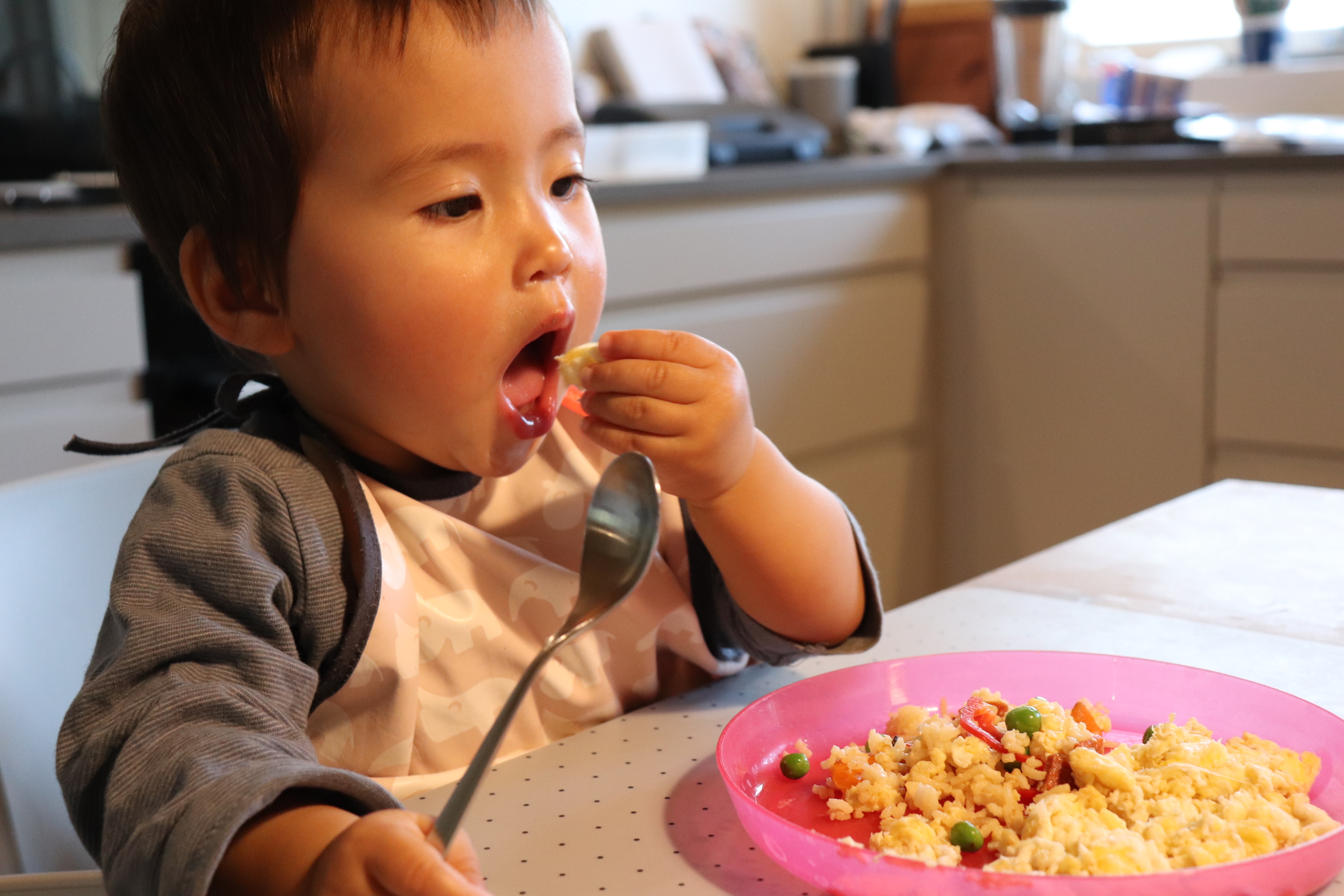 Fried rice baby eating